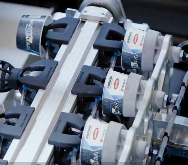 Production line from Campetella Robotic Center showing 3D parts printed with HP MJF